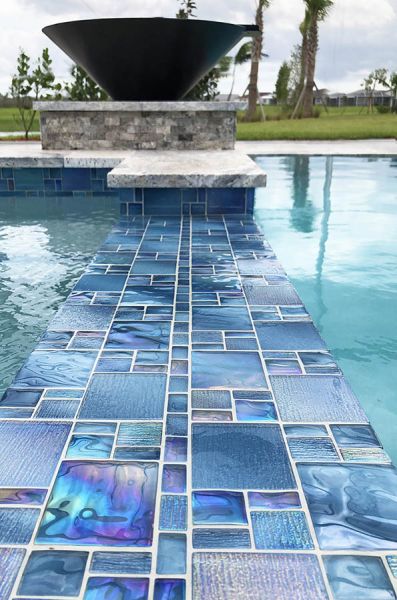Natural marble and glass mosaic tiles in earthy tones